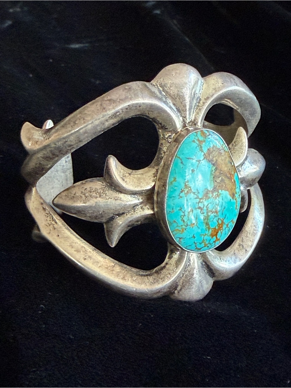 Vintage sandcast Navajo bracelet with natural turquoise stone